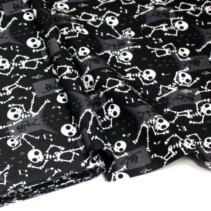 Tissu coton noir aux squelettes blancs - Collection Halloween - OEKO-TEX