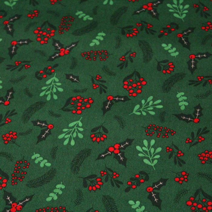 Tissu de coton de Noël vert aux feuilles de houx vertes et branches de sapins verts - COLLECTION NOËL - OEKO-TEX