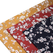 Tissu cotonnade HANA HANA, fleurs de cerisier japonais noir & blanc, fond rouge / bleu / jaune - OEKO - TEX - TissusPapi.com