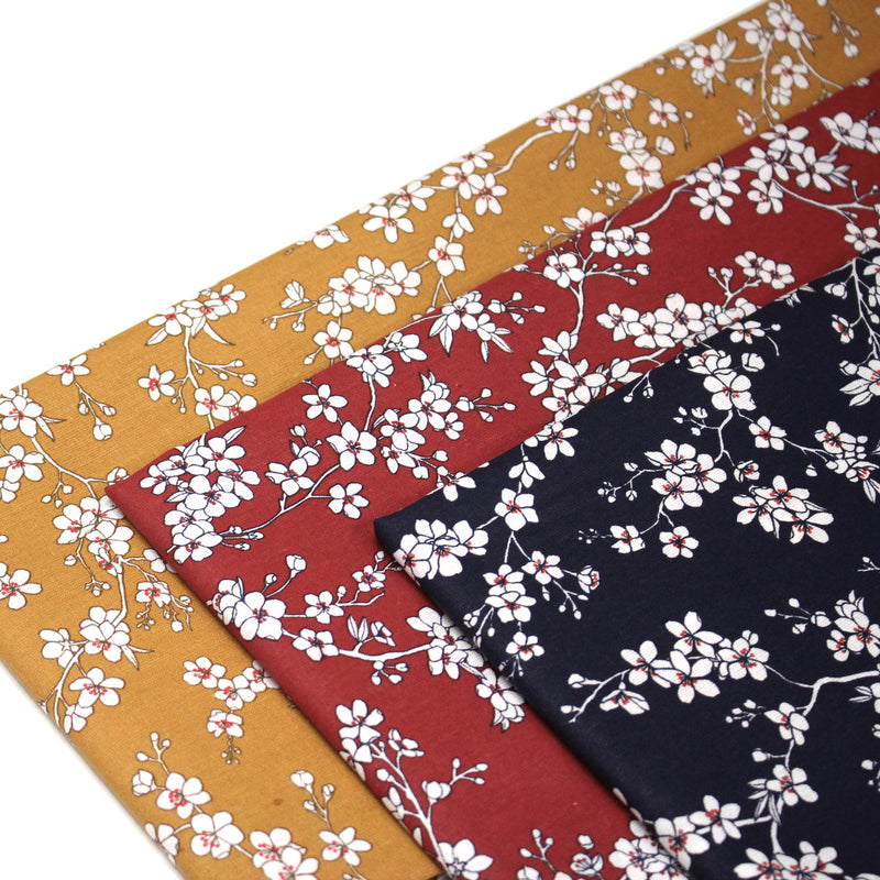 Tissu cotonnade HANA HANA, fleurs de cerisier japonais noir & blanc, fond rouge / bleu / jaune - OEKO - TEX - TissusPapi.com