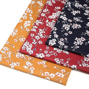 Tissu cotonnade HANA HANA, fleurs de cerisier japonais noir & blanc, fond rouge / bleu / jaune - OEKO - TEX - TissusPapi.com