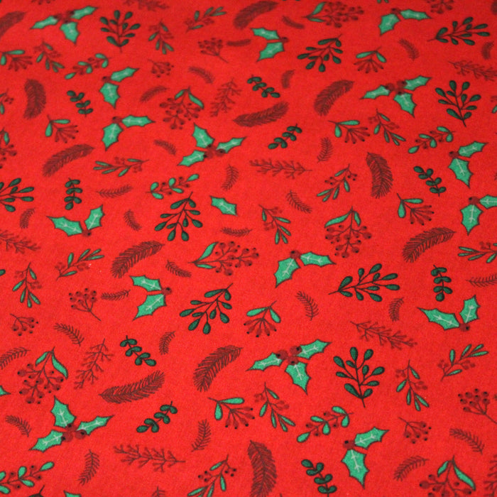 Tissu de coton de Noël rouge aux feuilles de houx vertes et branches de sapins verts - COLLECTION NOËL - OEKO-TEX