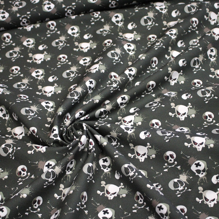 Tissu coton gris aux crânes et têtes de mort - Collection Halloween - OEKO-TEX