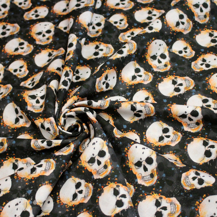 Tissu coton noir aux crânes et têtes de mort oranges - Collection Halloween - OEKO-TEX