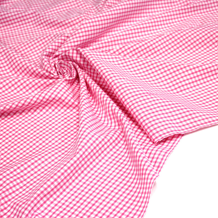 Tissu cotonnade blanc aux carreaux roses