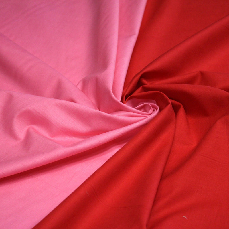 Tissu cotonnade bicolore uni : moitié jaune/moitié verte ou moitié rose/moitié rouge - TissusPapi.com