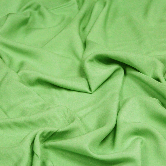 Tissu Viscose vert amande uni