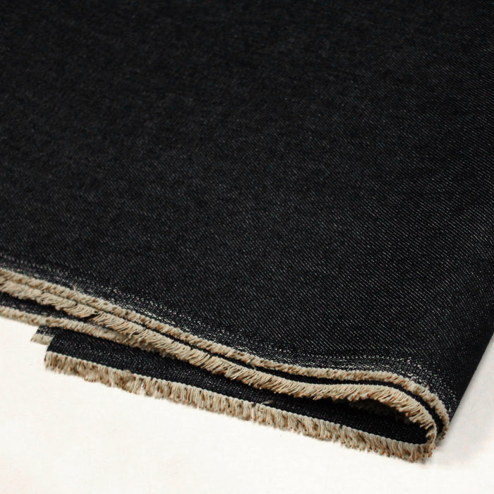 Tissu toile de jean denim brut noir uni 100% coton