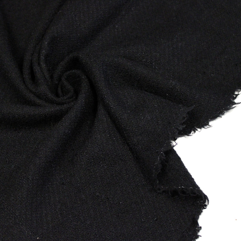 Tissu lainage souple noir au tissage rayures diagonales, fabrication française : idéal pour un tailleur!