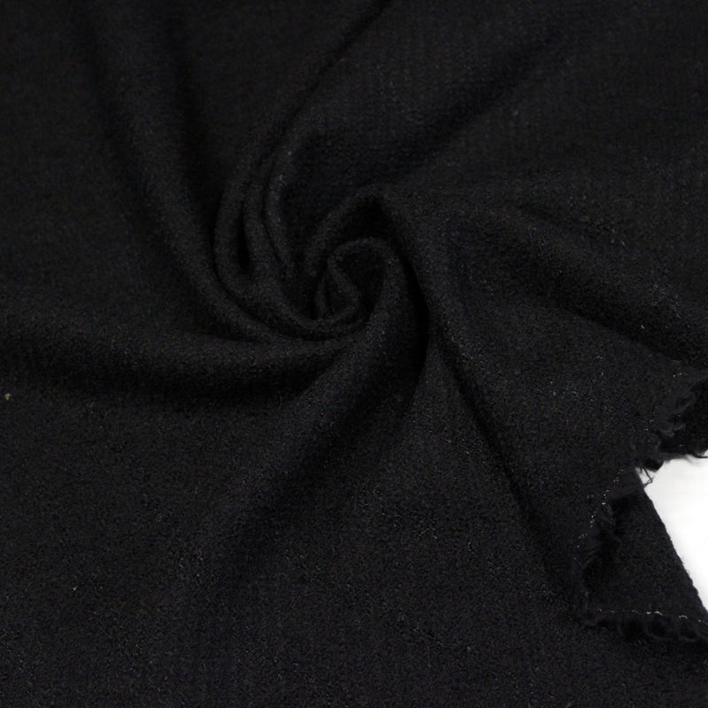 Tissu lainage souple noir au tissage rayures diagonales, fabrication française : idéal pour un tailleur!