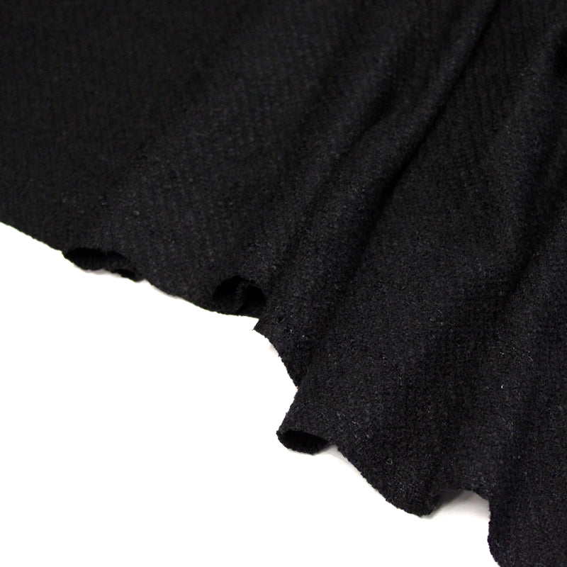 Tissu lainage souple noir au tissage rayures diagonales, fabrication française : idéal pour un tailleur!