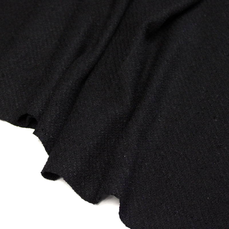 Tissu lainage souple noir au tissage rayures diagonales, fabrication française : idéal pour un tailleur!