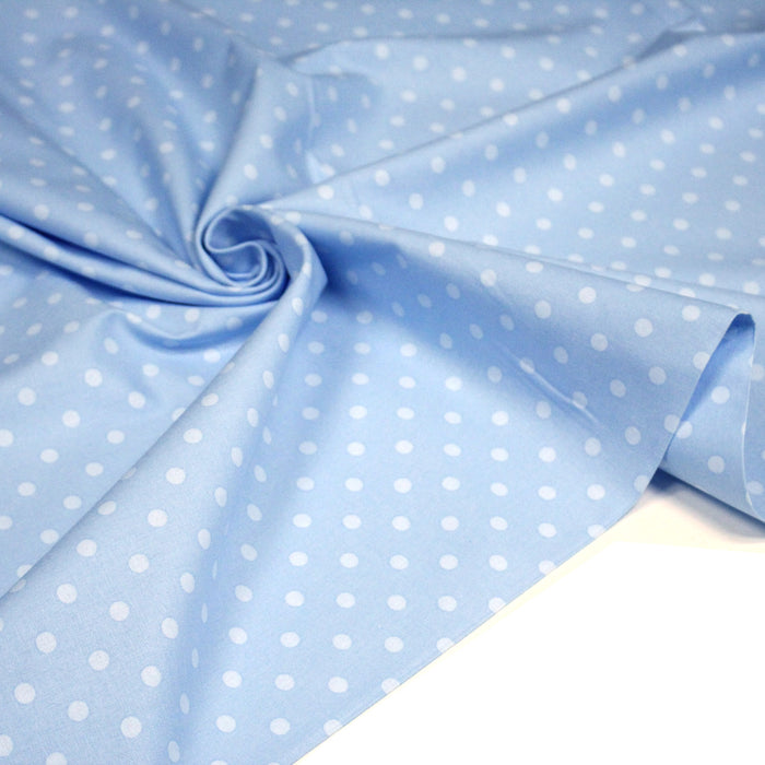 Tissu cotonnade bleu ciel aux pois bleus 6mm