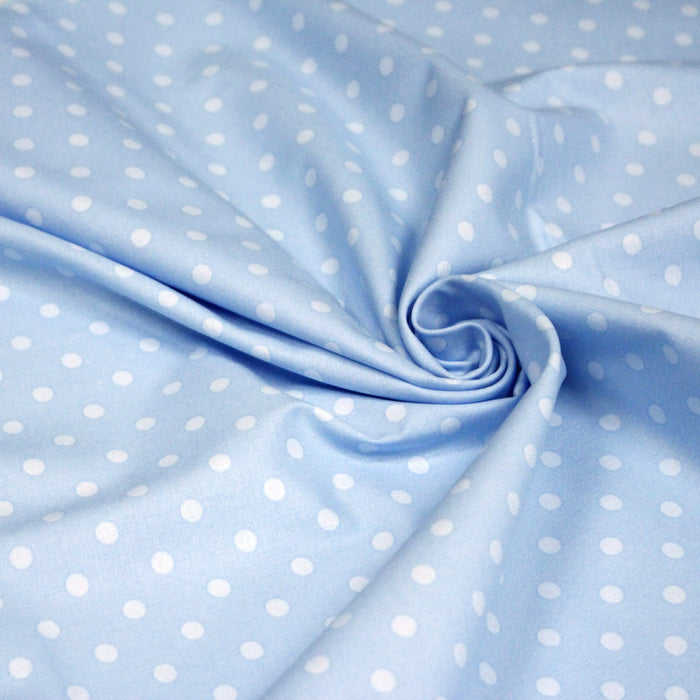 Tissu cotonnade bleu ciel aux pois bleus 6mm
