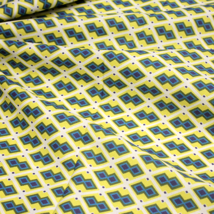 Tissu coton motifs WAX géométriques jaunes et bleus, fond blanc - OEKO-TEX