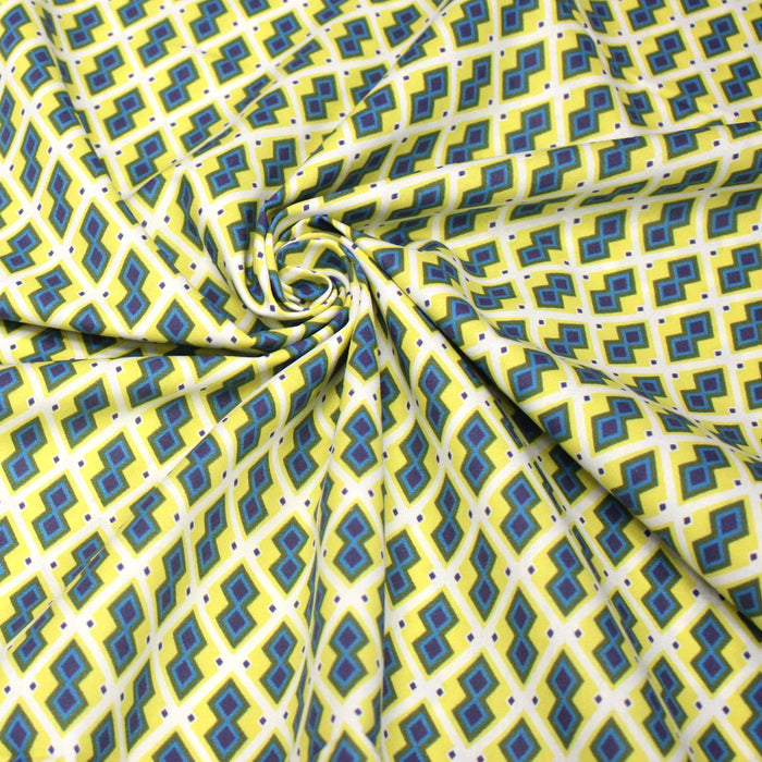 Tissu coton motifs WAX géométriques jaunes et bleus, fond blanc - OEKO-TEX