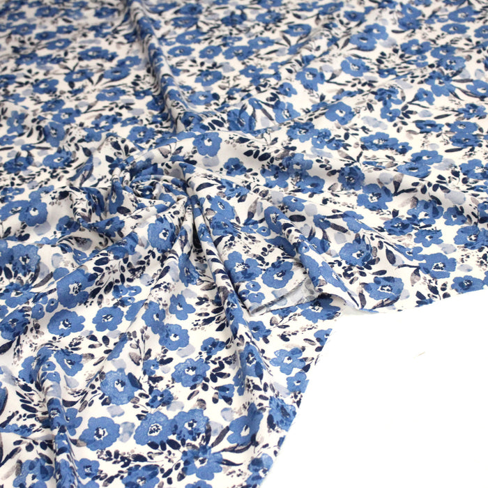 Tissu viscose jersey rose fuschia fleurs bleues - Au Fil de Léontine Tissu viscose jersey rose fuschia fleurs bleues - Au Fil de Léontine