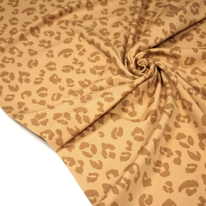 Tissu jersey coton LEOPARD crème aux taches cappuccino - OEKO-TEX