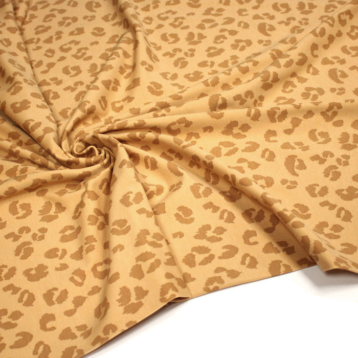 Tissu jersey coton LEOPARD crème aux taches cappuccino - OEKO-TEX