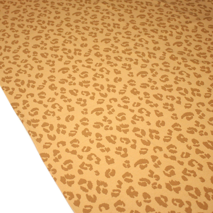 Tissu jersey coton LEOPARD crème aux taches cappuccino - OEKO-TEX