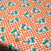 Tissu cotonnade enfant aux carreaux oranges, croissants et cafetière Moka - STANDARD 100 OEKO-TEX - TissusPapi.com
