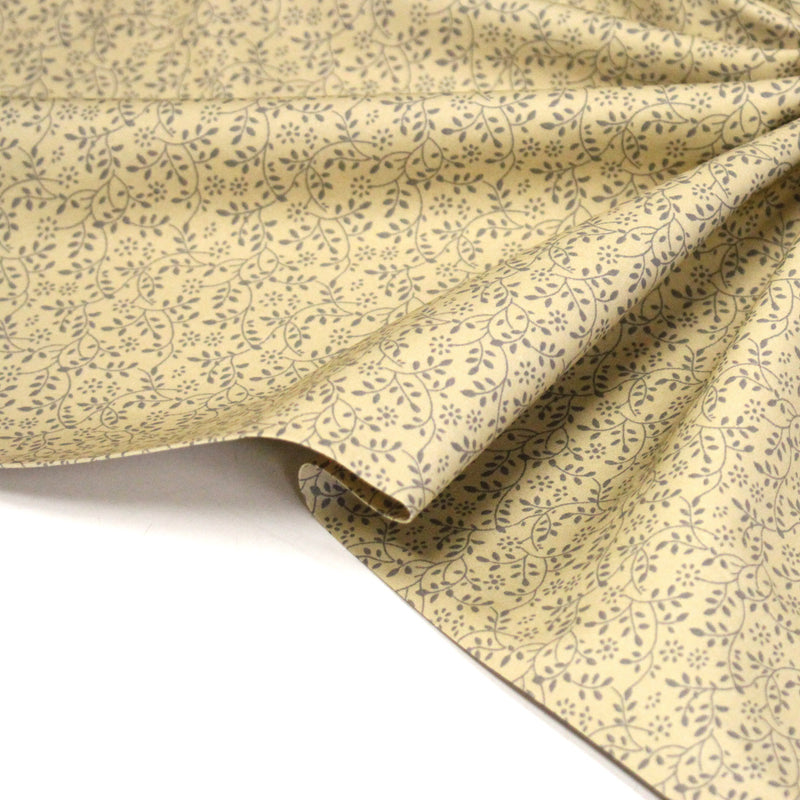 Tissu cotonnade BAMBURGH aux fines fleurs grises, fond crème - TissusPapi.com