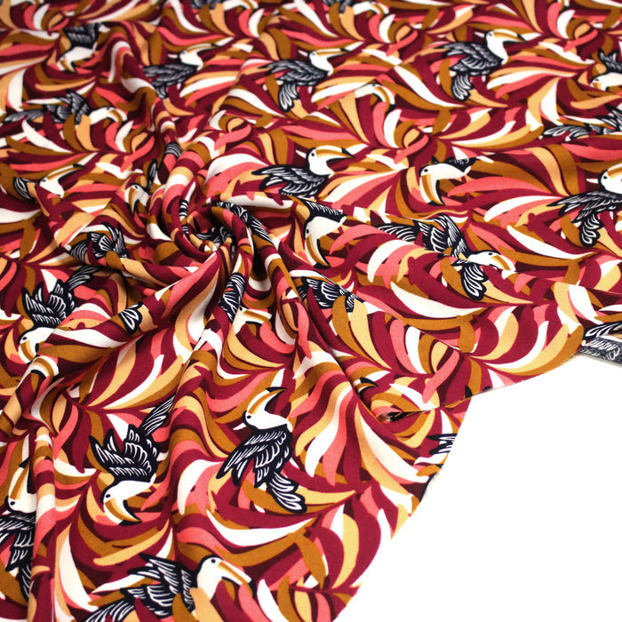 Tissu viscose fluide, motif floral & toucans : tons prune ou tons marine - OEKO-TEX STANDARD 100
