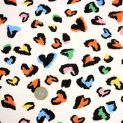 Tissu cotonnade blanc aux coeurs léopard multicolore, fond blanc casé - STANDARD 100 OEKO - TEX - TissusPapi.com