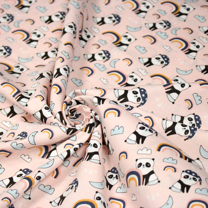 Tissu popeline coton ENFANT rose aux pandas endormis, arcs en ciel et nuages - TissusPapi.com