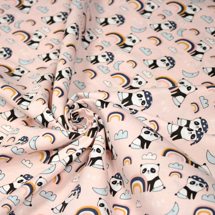 Tissu popeline coton ENFANT rose aux pandas endormis, arcs en ciel et nuages - TissusPapi.com