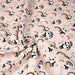 Tissu popeline coton ENFANT rose aux pandas endormis, arcs en ciel et nuages - TissusPapi.com