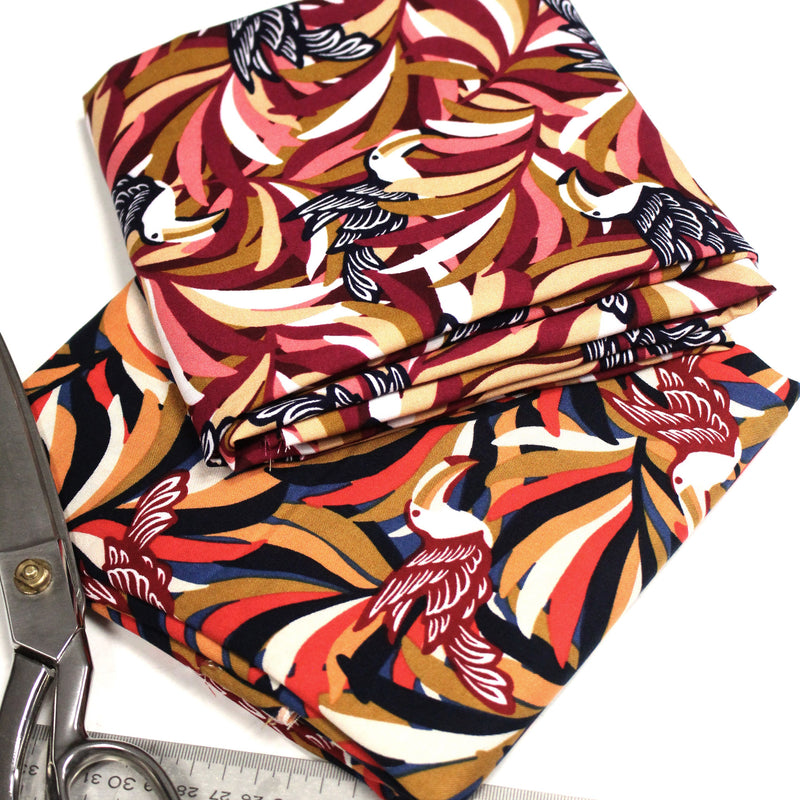 Tissu viscose fluide, motif floral & toucans : tons prune ou tons marine - OEKO - TEX STANDARD 100 - TissusPapi.com