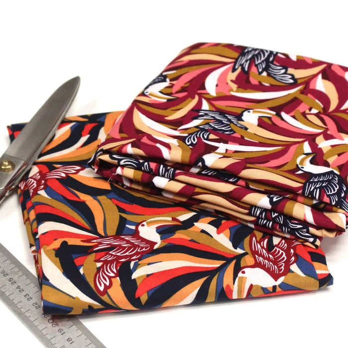 Tissu viscose fluide, motif floral & toucans : tons prune ou tons marine - OEKO-TEX STANDARD 100