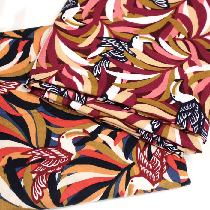 Tissu viscose fluide, motif floral & toucans : tons prune ou tons marine - OEKO-TEX STANDARD 100