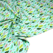 Tissu popeline coton vert aux feuilles vertes, jaunes, roses - TissusPapi.com