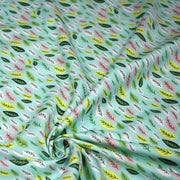 Tissu popeline coton vert aux feuilles vertes, jaunes, roses - TissusPapi.com