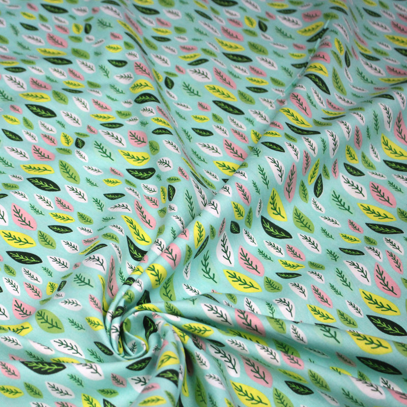 Tissu popeline coton vert aux feuilles vertes, jaunes, roses - TissusPapi.com