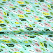 Tissu popeline coton vert aux feuilles vertes, jaunes, roses - TissusPapi.com