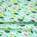 Tissu popeline coton vert aux feuilles vertes, jaunes, roses - TissusPapi.com