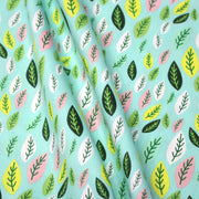 Tissu popeline coton vert aux feuilles vertes, jaunes, roses - TissusPapi.com