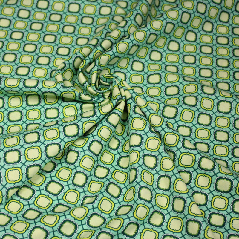 Tissu popeline coton vert aux formes géométriques vertes et jaunes - TissusPapi.com