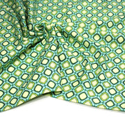 Tissu popeline coton vert aux formes géométriques vertes et jaunes - TissusPapi.com