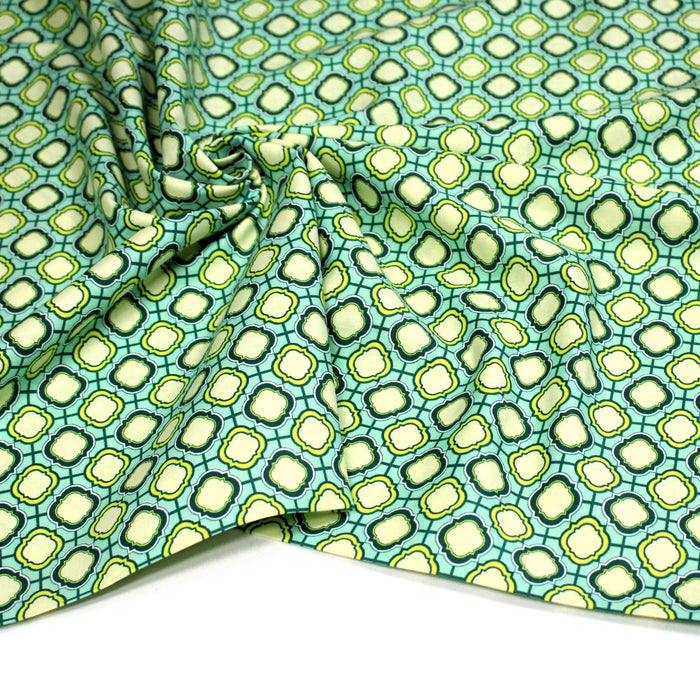 Tissu popeline coton vert aux formes géométriques vertes et jaunes - TissusPapi.com