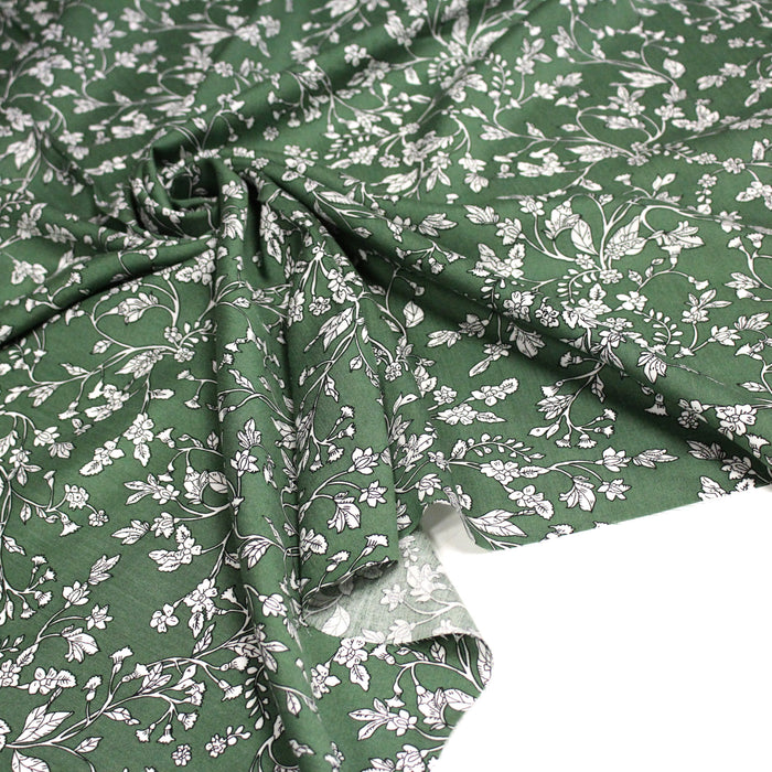 Tissu viscose fluide, fines fleurs blanches et noirs, fond ocre ou fond vert