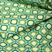 Tissu popeline coton vert aux formes géométriques vertes et jaunes - TissusPapi.com
