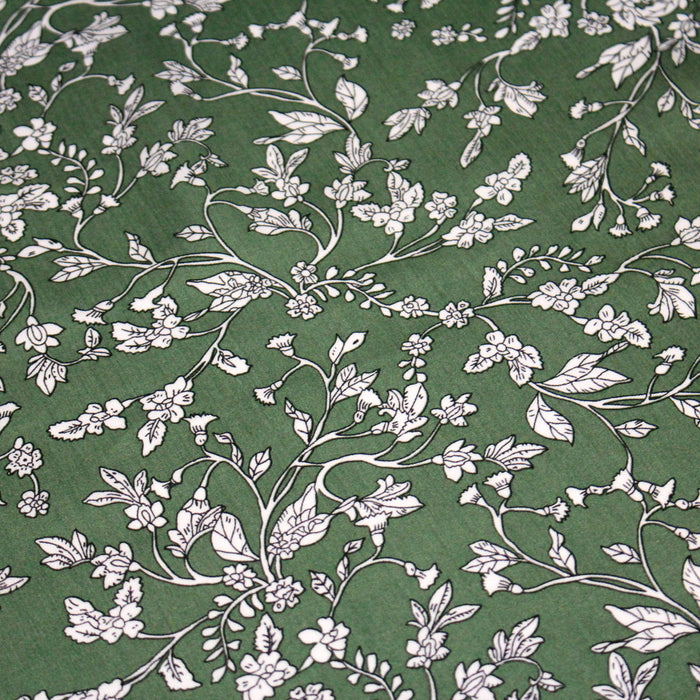 Tissu viscose fluide, fines fleurs blanches et noirs, fond ocre ou fond vert