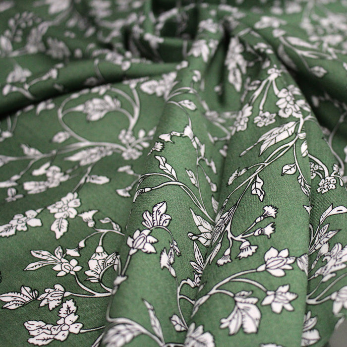 Tissu viscose fluide, fines fleurs blanches et noirs, fond ocre ou fond vert