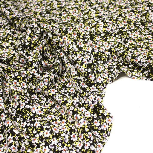 Tissu Viscose crêpe noir fleuri jaune blanc violet orange - TissusPapi.com