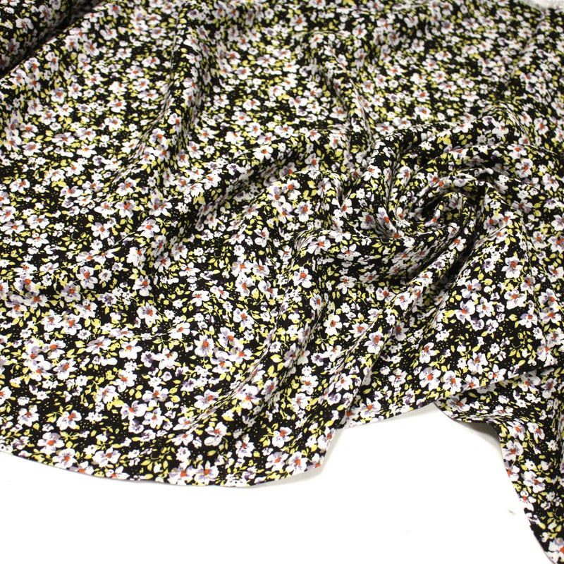 Tissu Viscose crêpe noir fleuri jaune blanc violet orange - TissusPapi.com