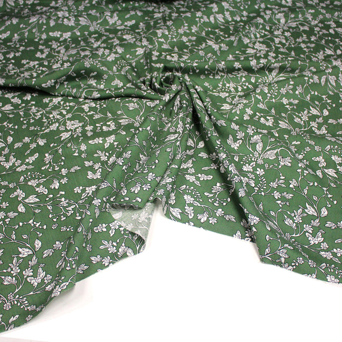 Tissu viscose fluide, fines fleurs blanches et noirs, fond ocre ou fond vert